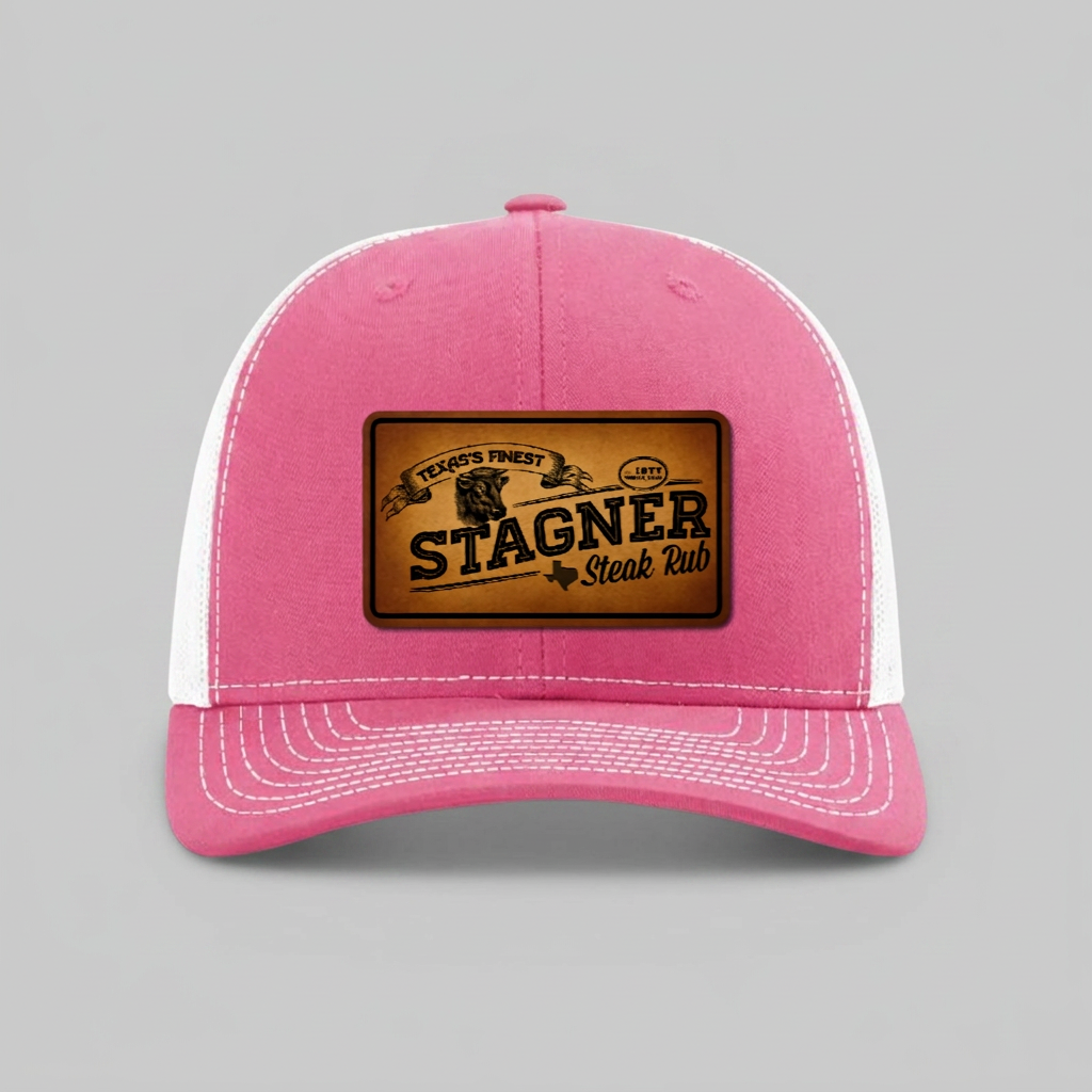 Stagner Brands Richardson 112 leather patch trucker hat split hot pink white front view dark background product photo